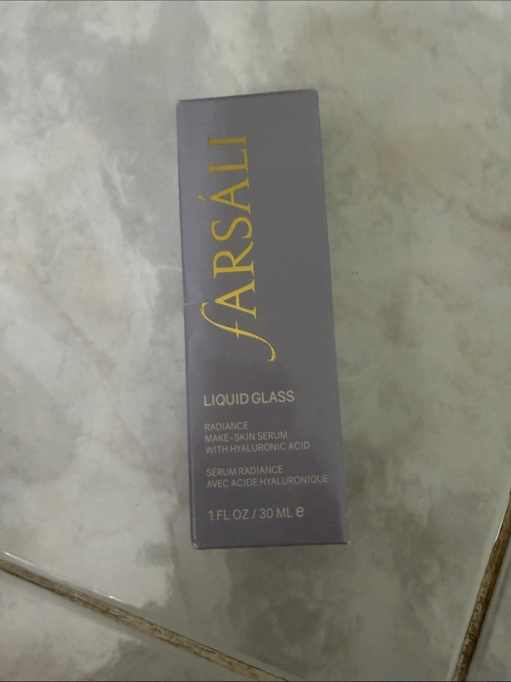 fARSALI Liquid Glass Serum in Lavender and Gold Packaging
